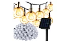 Șir decorativ de lumini solare pentru exterior Balls – 10 metri, alb cald