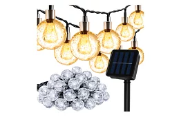 Șir decorativ de lumini solare pentru exterior Balls – 7 metri, alb cald