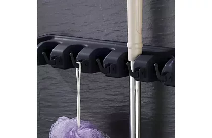 Suport de perete pentru unelte de grădină