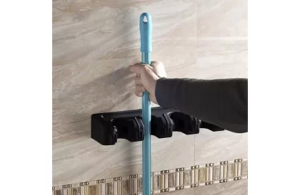 Suport de perete pentru unelte de grădină