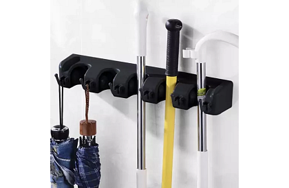 Suport de perete pentru unelte de grădină