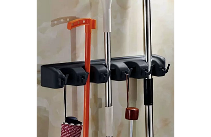 Suport de perete pentru unelte de grădină