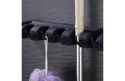 Suport de perete pentru unelte de grădină